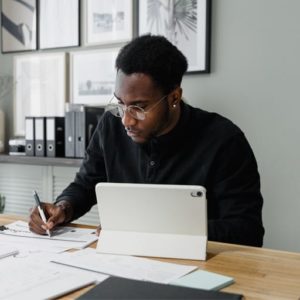 man looking over paperwork