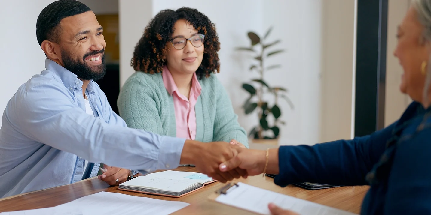 Couple having a meeting. Shaking hands Couple having a meeting. Shaking hands
